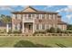 Brick two-story house with a landscaped lawn and walkway at 1018 Foxtail Dr., Longs, SC 29568