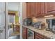 Well-equipped kitchenette with built-in appliances and granite countertops at 1018 Foxtail Dr., Longs, SC 29568