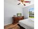 Bedroom with wood-look floors and large window at 481 Irees Way, Longs, SC 29568