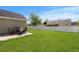 Fenced-in backyard with patio and grassy area at 481 Irees Way, Longs, SC 29568