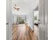 Bright living room with hardwood floors and sliding glass doors at 481 Irees Way, Longs, SC 29568