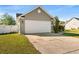 Single car garage with driveway and well-maintained lawn at 481 Irees Way, Longs, SC 29568