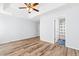 Bright bedroom with bathroom access and wood-look floors at 481 Irees Way, Longs, SC 29568