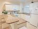 Kitchen with granite counters and breakfast bar at 110 South Shore Blvd. # 103, Longs, SC 29568