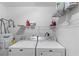 Laundry room with side-by-side Maytag washer and dryer at 8546 Hopkins Circle # G, Surfside Beach, SC 29575