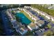 Aerial view of community showing building layout and pond at 8546 Hopkins Circle # G, Surfside Beach, SC 29575