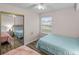 Bedroom with mirrored closet and two twin beds at 8546 Hopkins Circle # G, Surfside Beach, SC 29575