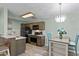 Modern kitchen with granite countertops, stainless steel appliances, and breakfast bar at 8546 Hopkins Circle # G, Surfside Beach, SC 29575