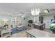 Open concept living room and kitchen with modern decor at 8546 Hopkins Circle # G, Surfside Beach, SC 29575