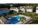 Aerial view of community pool and surrounding buildings at 8546 Hopkins Circle # G, Surfside Beach, SC 29575