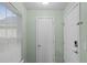 Light and airy entryway with white door and window at 8546 Hopkins Circle # G, Surfside Beach, SC 29575