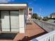 Side view of a spacious deck, overlooking a street and neighboring properties at 848 S Waccamaw Dr., Garden City Beach, SC 29576