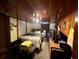 Bedroom with a double bed and wood paneled walls at 848 S Waccamaw Dr., Garden City Beach, SC 29576