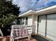 Deck with a white bench, offering a relaxing outdoor space at 848 S Waccamaw Dr., Garden City Beach, SC 29576
