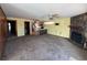 Living room with fireplace, carpet flooring, and view into kitchen at 848 S Waccamaw Dr., Garden City Beach, SC 29576