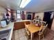 Kitchen features a dining table and views into the living room at 848 S Waccamaw Dr., Garden City Beach, SC 29576
