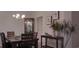 Formal dining room with dark wood table and chairs at 2808 Stellar Loop, Myrtle Beach, SC 29577