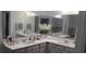 Spacious bathroom with double vanity and corner mirror at 2808 Stellar Loop, Myrtle Beach, SC 29577