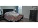 Cozy bedroom with a queen-size bed and dresser at 2808 Stellar Loop, Myrtle Beach, SC 29577
