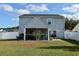 Large backyard with screened porch, basketball goal, and privacy fence at 276 Palmetto Glen Dr., Myrtle Beach, SC 29588