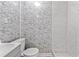 Bathroom with marble-look walls and a shower at 1632 Butts St., Georgetown, SC 29440