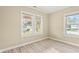 Bright bedroom featuring hardwood floors and two windows at 1632 Butts St., Georgetown, SC 29440