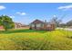 Red brick house with a green metal roof and walkway at 1632 Butts St., Georgetown, SC 29440