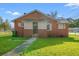 Red brick house with a metal roof and small porch at 1632 Butts St., Georgetown, SC 29440