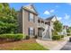 Two-story building with stairs and landscaping at 1025 Algonquin Dr. # 15-E, Pawleys Island, SC 29585