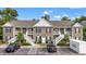 Aerial view of a three-unit building and parking at 1025 Algonquin Dr. # 15-E, Pawleys Island, SC 29585