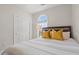 Bedroom with double bed, closet, and window at 1025 Algonquin Dr. # 15-E, Pawleys Island, SC 29585