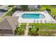 Inviting community pool with ample lounge chairs and a shaded area at 1025 Algonquin Dr. # 15-E, Pawleys Island, SC 29585