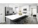 Modern kitchen with white cabinets, stainless steel appliances, and an island at 2740 Rowyn St., Longs, SC 29568
