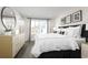 Spacious bedroom with large window and neutral decor at 2740 Rowyn St., Longs, SC 29568