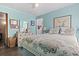 Bedroom with a dresser and a queen-size bed at 6001 South Kings Hwy., Myrtle Beach, SC 29575