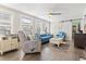 Bright living room features comfy seating and a barn door at 6001 South Kings Hwy., Myrtle Beach, SC 29575