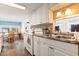 Kitchen with adjacent dining area and stove at 6001 South Kings Hwy., Myrtle Beach, SC 29575