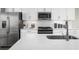 Modern kitchen featuring stainless steel appliances and white cabinetry at 2760 Rowyn St., Longs, SC 29568