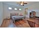Cozy bedroom with a double bed, hardwood floors, and built in shelving at 1065 Wigeon Dr., Conway, SC 29526