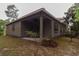 Exterior view of house with covered patio and landscaping at 1065 Wigeon Dr., Conway, SC 29526