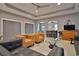 Open concept living room and kitchen with stylish furniture at 1065 Wigeon Dr., Conway, SC 29526