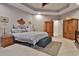 Spacious Primary bedroom with large bed, ample closet space, and wood furniture at 1065 Wigeon Dr., Conway, SC 29526