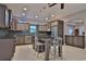 Modern kitchen with dark gray cabinets, granite countertops, and island at 1065 Wigeon Dr., Conway, SC 29526