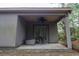 Covered patio with ceiling fan and storage cabinet at 1065 Wigeon Dr., Conway, SC 29526
