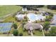 Aerial view of community amenities, including a pool, clubhouse, and tennis courts at 1065 Wigeon Dr., Conway, SC 29526