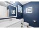 Bathroom with navy blue walls and white vanity at 6001 - 1581 S Kings Hwy., Myrtle Beach, SC 29575