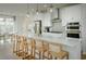 Modern kitchen with island, stainless steel appliances, and white cabinets at 8481 Duke Pl. # 35, Myrtle Beach, SC 29572