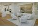 Cozy sitting area with four armchairs, a wine rack, and large artwork at 8481 Duke Pl. # 35, Myrtle Beach, SC 29572