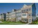 Row of charming townhouses with landscaping and sidewalk at 8481 Duke Pl. # 35, Myrtle Beach, SC 29572