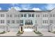 Beautiful teal three-story townhome with a two-car garage at 8483 Duke Pl. # 36, Myrtle Beach, SC 29572
